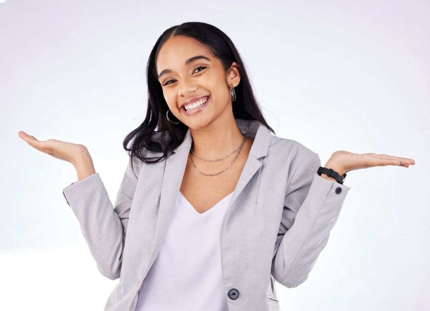 lady with laptop in hand and people at her back